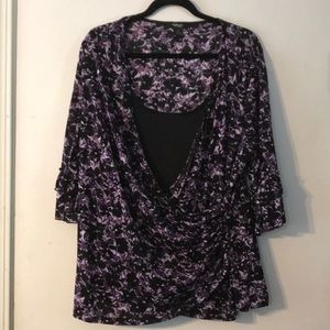 Blouse with an attached black camisole.